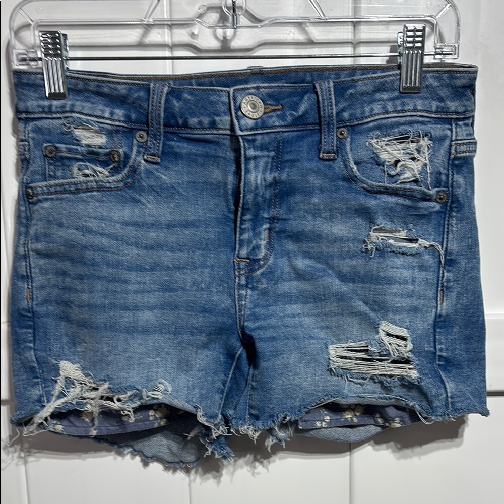 American Eagle distressed light blue jean shorts